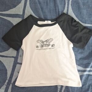 White t-shirt with black sleeves